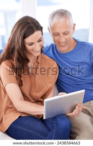 Couple, tablet and happy on couch in home with reading, search and app to watch movie with bonding. People, woman and mature man on digital touchscreen to relax in lounge with connection in house
