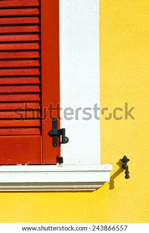 red window  varano borghi palaces italy   abstract  sunny day    wood venetian blind in the concrete  brick   
