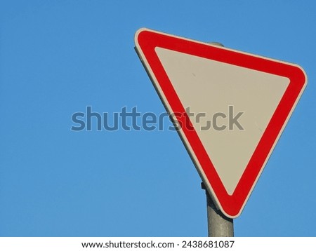 road sign obliging to give way to vehicles