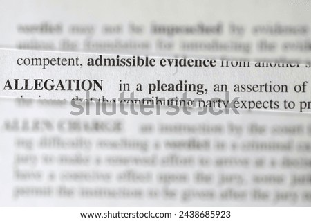 close up photo of the word allegation Royalty-Free Stock Photo #2438685923