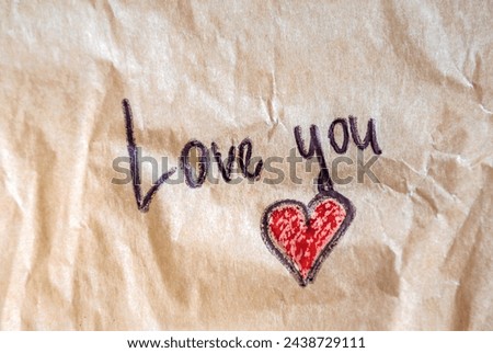 Love you note on crumpled paper