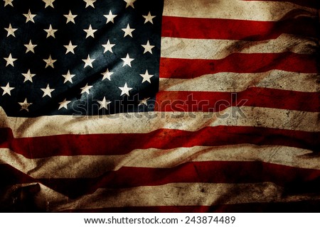 Closeup of grunge American flag Royalty-Free Stock Photo #243874489