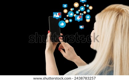 Woman using smartohone in smart house, empty screen Royalty-Free Stock Photo #2438783257