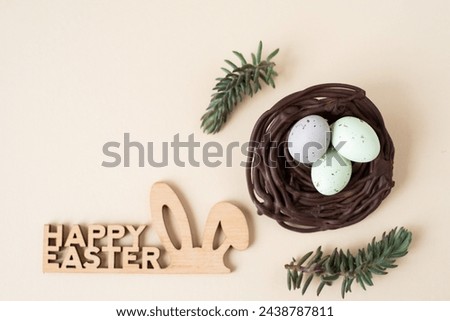 Happy Easter lettering and dessert in the form of a sweet nest with eggs
