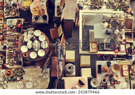 aerial view of a stall in a flea market full of bits and pieces Royalty-Free Stock Photo #243879466