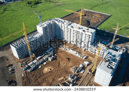 New building. Construction of a panelized high-rise building. Panoramic aerial view of the construction site.
