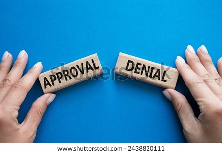 Answer or Question symbol. Concept word Answer or Question on wooden blocks. Businessman hand. Beautiful blue background. Business and Answer or Question concept. Copy space Royalty-Free Stock Photo #2438820111