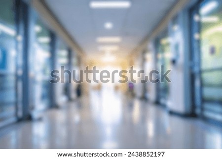 blurred of background. interior of a modern hospital with an empty long corridor. waiting room for patients and families between the corridor with bright white lights. treatment rooms and patient room Royalty-Free Stock Photo #2438852197