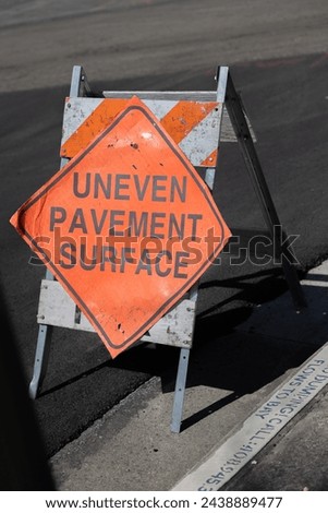 construction sign uneven pavement surface