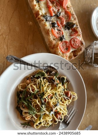 Italian food, pasta and pizza.