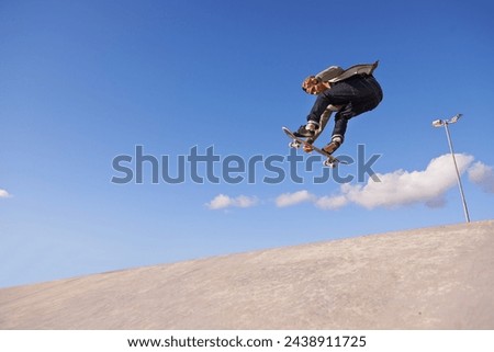 Skateboard, blue sky and man with ramp, fitness and training for a competition and sunshine. Adventure, person and skater with practice for technique and skating style with exercise, energy or cardio