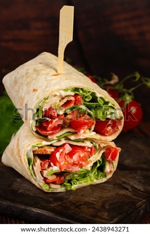 Delicious tortilla wraps with chicken and vegetables