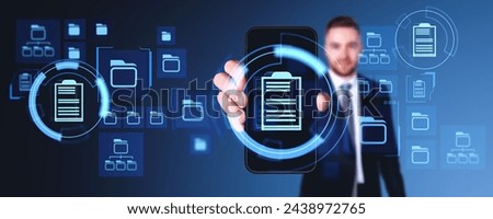 Businessman hand showing smartphone screen, glowing document management system hologram, files, documents or contract. Concept of business information storage and administrator