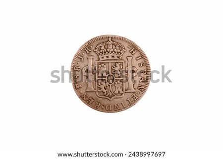 former silver spanish coin isolated on white background former means of payment