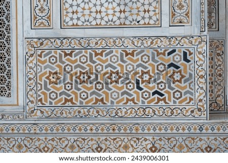 Beautiful marble inlay work. Pietra Dura inlay art technique used to build Taj Mahal, consists of Floral or Calligraphic inlays. Artwork of Taj Mahal is purely handmade by the highly skilled artisans. Royalty-Free Stock Photo #2439006301