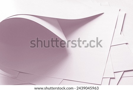Large sheets of paper in pink.