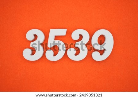 Orange felt is the background. The numbers 3539 are made from white painted wood.