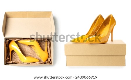 Different view of stylish female high heeled shoes and box on white background