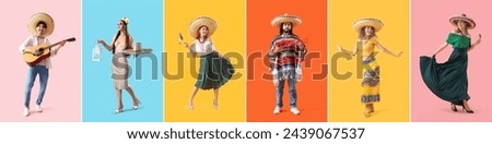 Group of happy Mexican people with national symbols on color background Royalty-Free Stock Photo #2439067537
