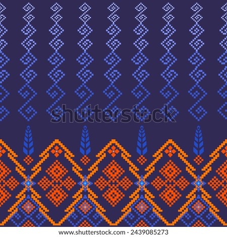 S pattern, blue gradient on a dark blue background. The bottom edge has an orange flower pattern, Thai ethnic pixel pattern, like a cross-stitch pattern. Royalty-Free Stock Photo #2439085273