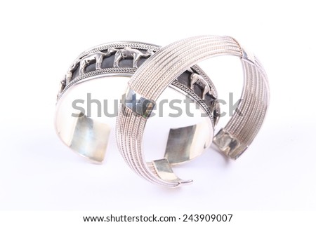 Close up of silver gold jewelery / bracelet in round shape for fashion and beauty background