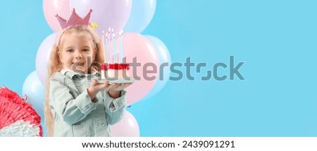 Cute little girl with Birthday cake on blue background with space for text