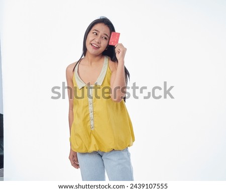 Woman holding credit card on white background. Space for text