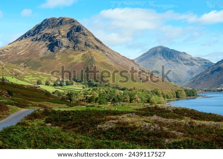 View along Wastwater towards Great Gable and Yewbarrow at the head of the lake. Royalty-Free Stock Photo #2439117527