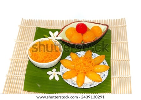 Special menu with delicious dessert put on banana leaf with isolated picture.