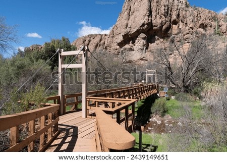 Suspension bridge on the hiking trails of Boyce Thompson Arboretum - Superior Arizona Royalty-Free Stock Photo #2439149651