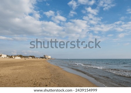 View on sandy beach of Terracina, Tyrrhenian Sea bay, ancient Italian city in province Latina in winter, Italy