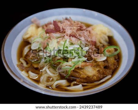 Flat udon or thick Japanese noodles with dried bonito called “Kishimen”. The soul food of Aichi Prefecture in Japan
 Royalty-Free Stock Photo #2439237489