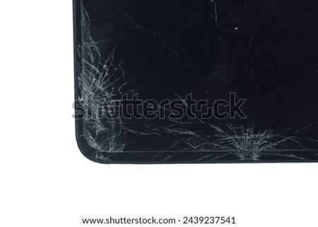 Close-up view of cracked smartphone cellphone screen isolated on white background