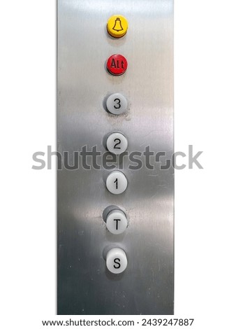 1970s vintage elevator buttons with red alt key and yellow alarm key on aluminum dashboard isolated on white with clipping path included