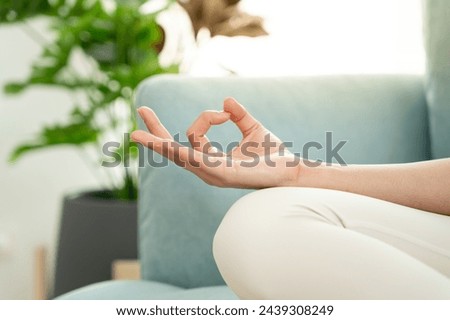 woman practicing meditate in condominium. Asian woman do exercises in morning. balance, recreation, relaxation, calm, good health, happy, relax, healthy lifestyle, reduce stress, peaceful, Attitude. Royalty-Free Stock Photo #2439308249