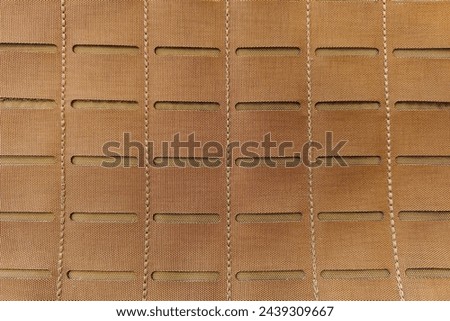 New laser cut Molle, brown color, used for making tactical style bags.