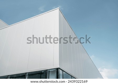 Modern Commercial Building Facade Against Blue Sky