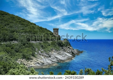 Corsica, the Losse tower, ancient genoese fortress on the coast, seascape in spring Royalty-Free Stock Photo #2439330289