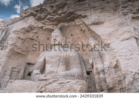 Yungang Grottoes. World cultural heritage. One of China's four most famous Buddhist Caves Art Treasure Houses, is located Datong, Shanxi Province. It is cave 20. Buddha is 13.7 metres high.
