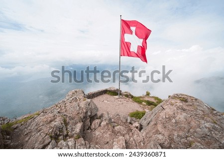 Swiss flag on the Great Mythen in the canton of Schwyz, Switzerland