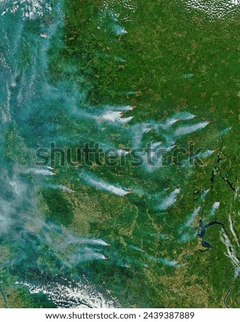 Fires and smoke in central Russia. Fires and smoke in central Russia. Elements of this image furnished by NASA. Royalty-Free Stock Photo #2439387889
