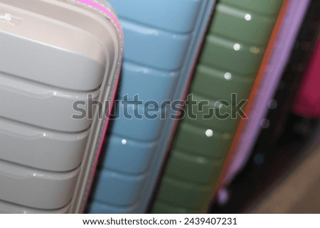 Passengers luggage. Shop. Suitcases in dry goods store. Stock photo. Colorful