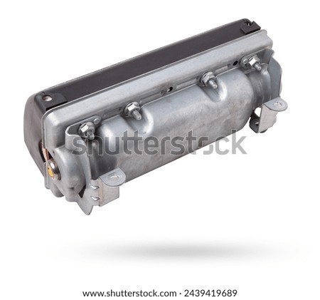 Spare part and interior element from a car passenger airbag in the dashboard on a white isolated background. Auto service industry. Royalty-Free Stock Photo #2439419689