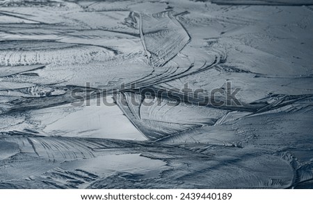 Pattern of frozen lake surface