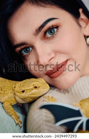 Beautiful Woman Posing with Her Adorable Bearded Dragon Pets