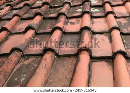Traditional aged clay roof tile background