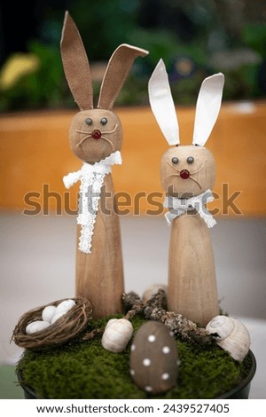 Easter bunnies with easter eggs home decoration