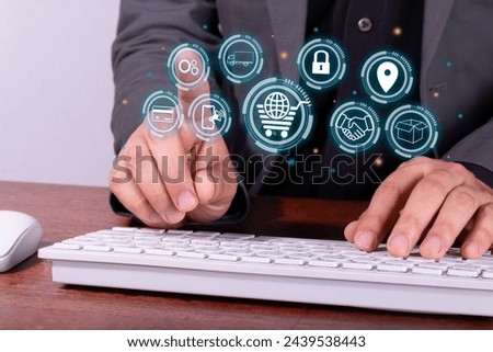 businessman moves in the electronic market. e-commerce concept. icons.
