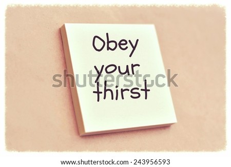 Text obey your thirst on the short note texture background