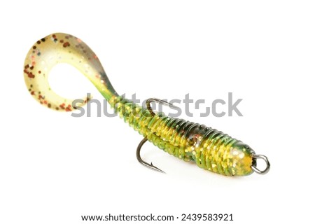 Soft fishing bait for predatory fish, moss green plastic grub, with double hook, isolated on white background Royalty-Free Stock Photo #2439583921